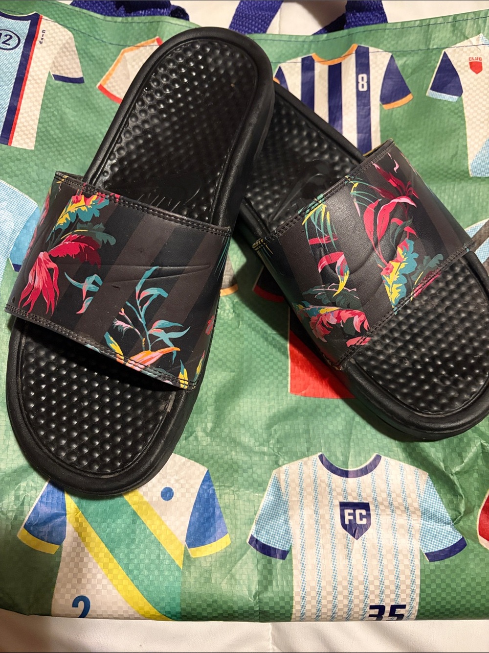 Nike Black Floral Slide Sandals with Pink & Teal Accents